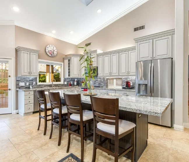 transitional kitchen with a entertainer’s island kierland